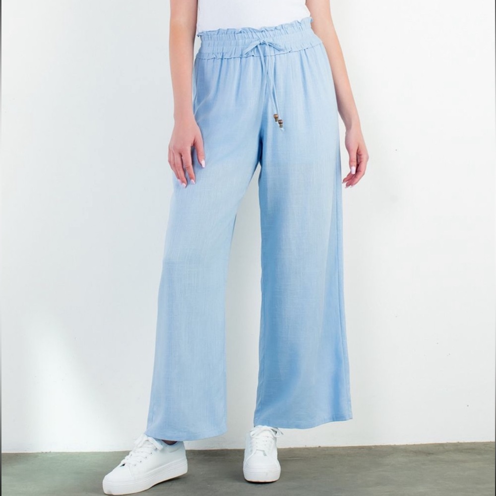New w tags. THML flowy pants a drawstring.